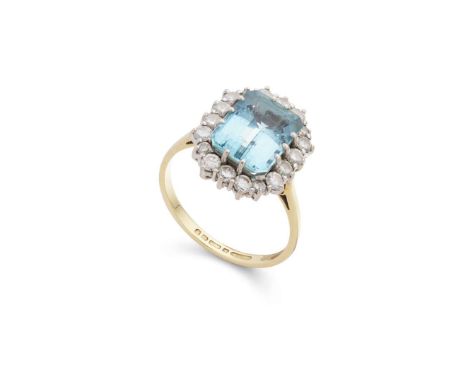  An 18ct gold aquamarine and diamond cluster ring  Claw-set with a rectangular step-cut aquamarine, in a border of round bril