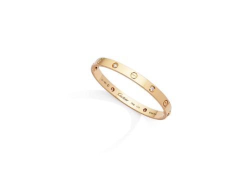  Cartier: A diamond 'Love' bangle  With alternating screw-head motifs and four round brilliant-cut diamonds, signed Cartier, 
