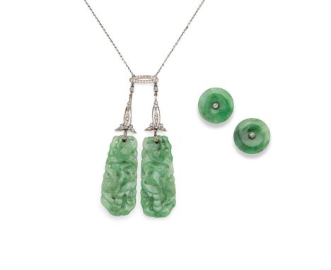  An early 20th century carved jade and diamond pendant necklace and earrings  The trace-link chain suspending a millegrain ov