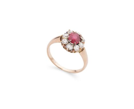  A ruby and diamond cluster ring  Claw-set with a cushion-cut ruby in a border of eight old round-cut diamonds, plain band, u