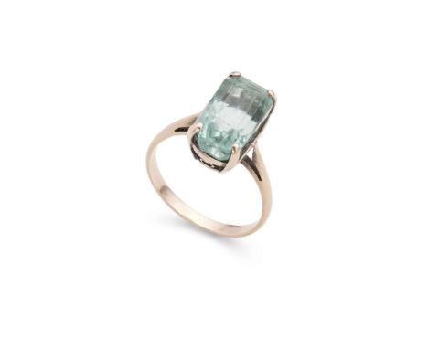  An aquamarine dress ring  Claw-set with a rectangular cushion-cut aquamarine, plain band, unmarked Ring size: O/P   