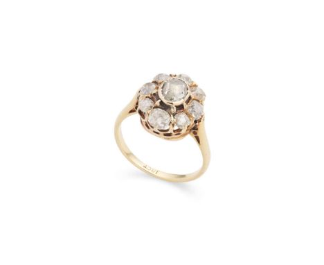  A diamond cluster ring  Set with a foil-backed rose-cut diamond, in a surround of cushion-shaped diamonds, plain band, unmar