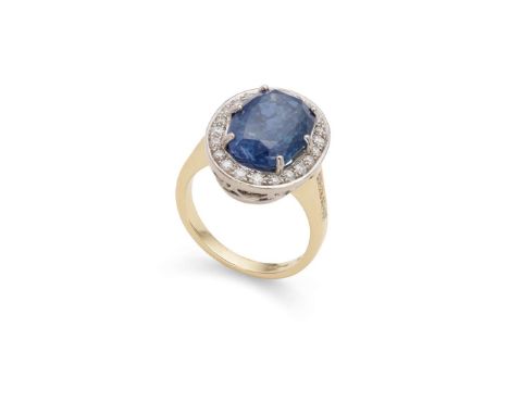  An 18ct gold sapphire and diamond cluster ring  Claw-set with an oval-cut sapphire weighing approximately 9.60cts, in a bord