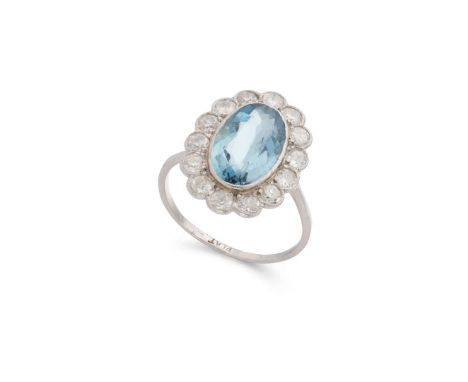 An aquamarine and diamond cluster ring Collet-set with an oval-cut aquamarine in a border of old round-cut diamonds, plain ba