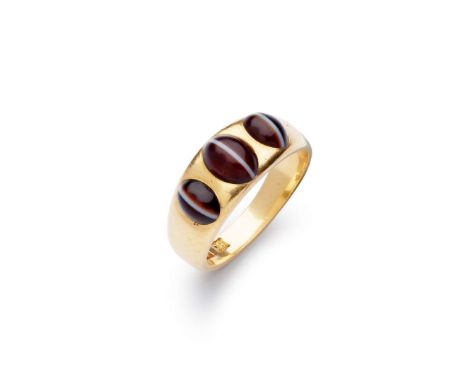  A banded agate three-stone ring  Gypsy-set with three cabochon banded agates, plain band, stamped 18 Ring size: J   