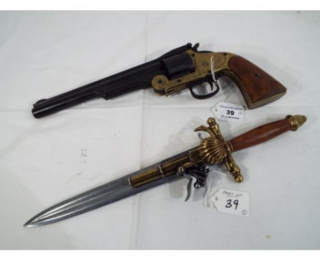 Two replica pistols comprising a Schofield Model 1875 Single Action Break-Top Revolver and a flintlock dagger gun [2] - Est £