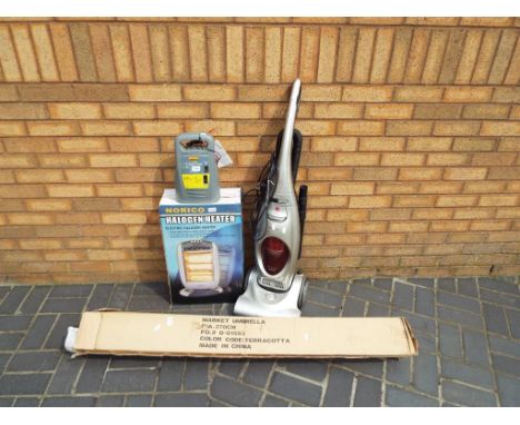 A good lot to include a Morphy Richards Ultra Light Cyclone vacuum cleaner, a Norico halogen heater in original box, Halfords