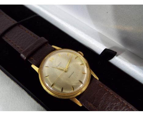 A gentleman's 1960s Timex watch with brown leather condor strap, boxed - This lot MUST be paid for and collected, or delivery