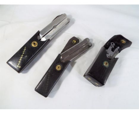 Leatherman - A Leatherman super tool comprising knives pliers screwdrivers, ruler and similar contained in a leather carry ca