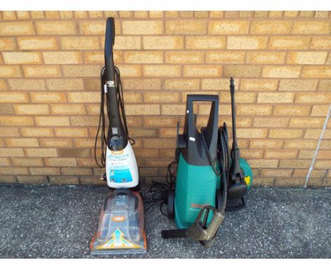 A good quality Bosch pressure washer and a Vax Rapide carpet washer (2) - This lot MUST be paid for and collected, or deliver
