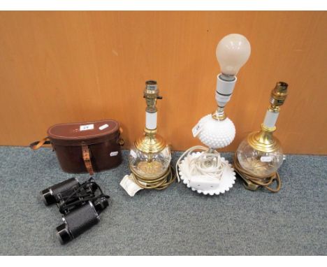 A pair of decorative brass and cut glass table lamps approximately 28 cm (h), a further table lamp of white metal and milk gl