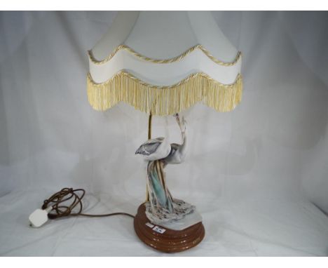 A good quality ceramic table lamp on wooden plinth, the plaque marked R. Pennatali, 80 cm (h) - This lot MUST be paid for and