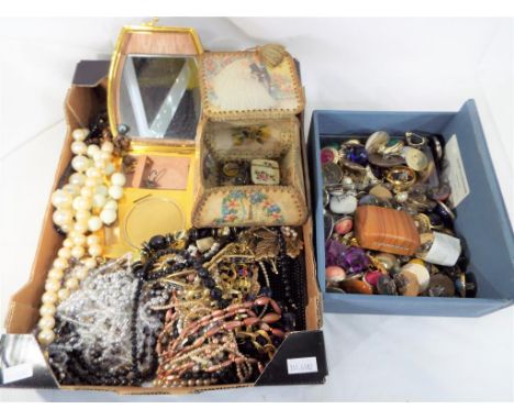 Two boxes containing a large quantity of costume jewellery to include bracelets, necklaces, clip-on earrings also included in