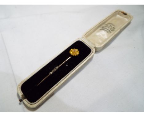 A 14 carat gold, single stone set stick pin, 1.34 gm - This lot MUST be paid for and collected, or delivery arranged, no late