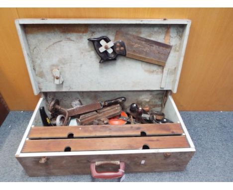 Hand tools - a wooden chest containing a quantity of hand tools - This lot MUST be paid for and collected, or delivery arrang