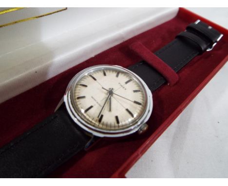 A 1960s gentleman's Timex wristwatch with leather strap, boxed - This lot MUST be paid for and collected, or delivery arrange