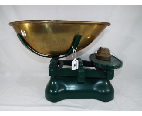 A set of large cast iron and brass weighing scales with weights 33 cm (h)  - This lot MUST be paid for and collected, or deli