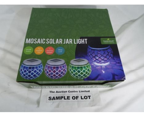 Two sets of nine unused mosaic solar jar lights by Garden Kraft Garden Lighting in presentation boxes and outer cardboard cas