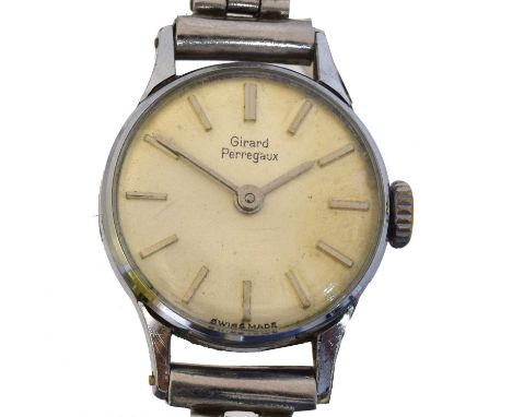A ladies stainless steel manual wind Girard-Perregaux wristwatch. The signed dial with baton markers, signed 17 jewel manual 