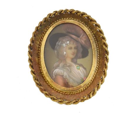 An 18ct gold portrait miniature brooch. The oval shape portrait miniature depicting a lady, set with single cut diamonds and 