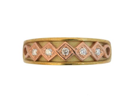 A 9ct gold Clogau diamond band ring. The brilliant cut diamond line inset to the bi-colour band, signed Clogau, hallmarks for