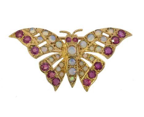 A 9ct gold opal and ruby butterfly brooch. Set with opal cabochons and circular shape rubies, HBJ, London, 1986, length 4.2cm