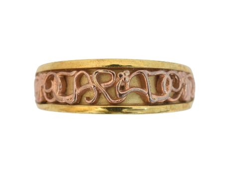 A 9ct gold Clogau 'Cariad' band ring. The bi-colour band with scrolling 'Cariad' text and foliate motifs, signed Clogau, hall
