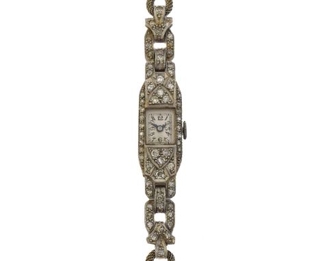 An early 20th century diamond cocktail watch. The rectangular dial with arabic markers and outer chapter ring, 17 jewel manua