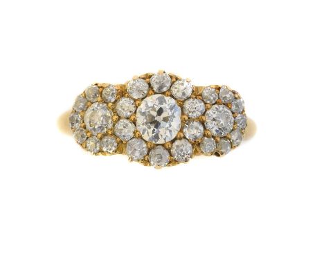 A late Victorian 18ct gold diamond cluster ring. Designed as a triple old cut diamond cluster, estimated total diamond weight