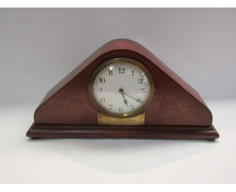 A 1920's inlaid mahogany presentation mantel clock, Arabic dial, missing foot 