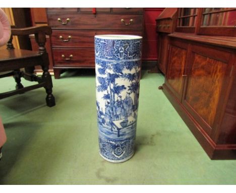 A blue and white conical ceramic umbrella stand depicting Oriental scenes, 61cm tall 