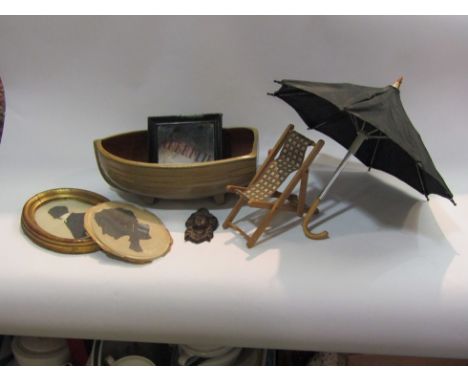 A ceramic boat dish with associated contents, silhoutte etc. 