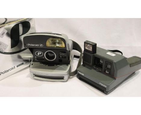 Two Polaroid 600 instant film cameras, a Polaroid Impulse &amp; a Polaroid P, the latter is boxed with instructions, both in 