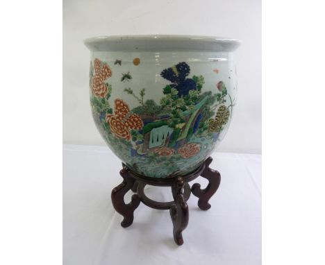Chinese ceramic fish bowl decorated with flowers and leaves on hardwood stand, 45.5cm diameter, 66 cm (h) incl. stand