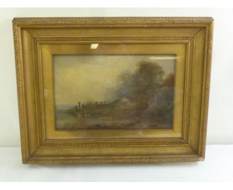 Corot framed and glazed oil on panel of a cottage by a river, signed bottom left, 32.5 x 51.5cm