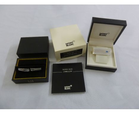 A cased Dunhill set of cufflinks and a Mont Blanc silver and blue stone money clip in original packaging