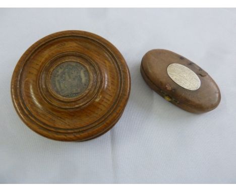 A circular oak snuff box fashioned from the mid 18th century ship the Royal George, the pull off cover set with a George II c