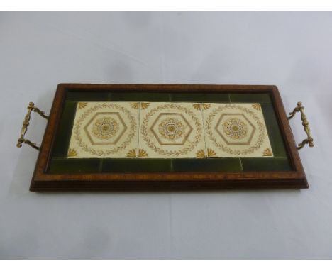 A rectangular Edwardian inlaid wooden tea tray inset with three ceramic tiles