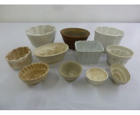 Ten 19th century ceramic jelly moulds of various shapes and forms