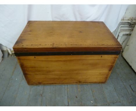 Army and Navy rectangular wooden trunk with brass handles and metal border, lined with sandalwood