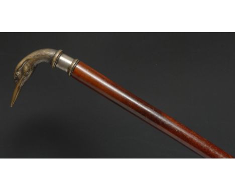 A 19th century novelty walking stick, the hanfdle cast as the head of a duck, malacca cane, 84cm long 
