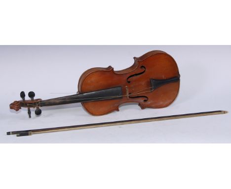 A violin, the two-piece back 35.75cm long excluding button, ebonised tuning pegs, outlined throughout with purfling, 60.5cm l