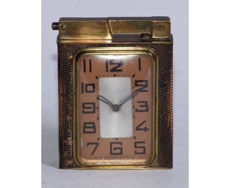 A French Art Deco combination table cigarette lighter and travelling timepiece, the 5cm rounded rectangular clock dial with s