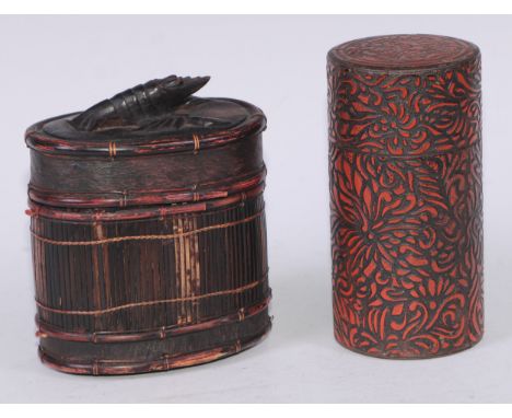 An unusual 19th century toleware  chinoiserie cylindrical tea caddy, in imitation of Chinese cinnabar lacquer, push-fitting c