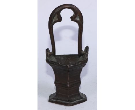 A Gothic bronze holy water stoup, the swing handle cast with tracery, 15.5cm high overall 