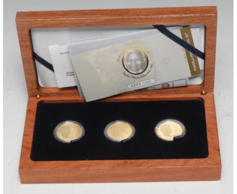 Nelson Mandela - Coins and Medals - A Nelson Mandela, Mint of Norway 24ct gold set of three commemorative medallions, preside