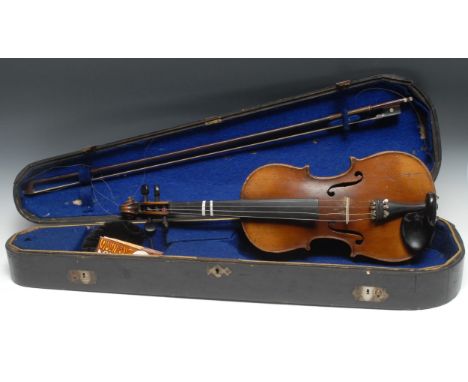 A violin, the two-piece back 33.5cm long excluding button, paper label printed Manufactured in Dresden in Imitation of Antoni