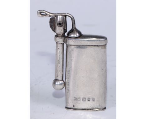A World War I period silver cigarette lighter, 6cm long, Reg.No 66457, C C May &amp; Sons, London 1918 