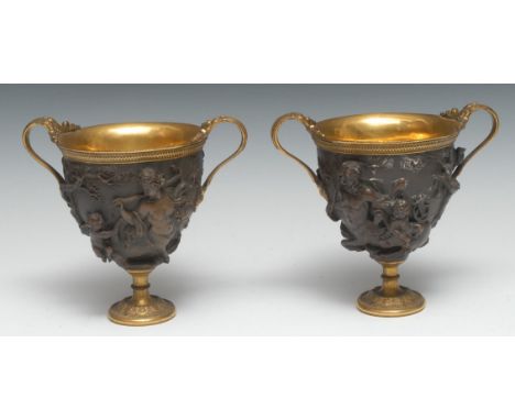 A pair of 19th century gilt and brown patinated krater vases, facsimiles after the antique, by Elkington, Mason &amp; Co, in 