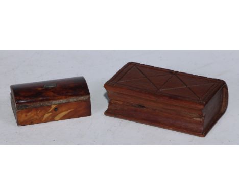 A 19th century mahogany novelty snuff box, as a book, sliding cover, 10cm long; a 19th century tortoiseshell miniature casket